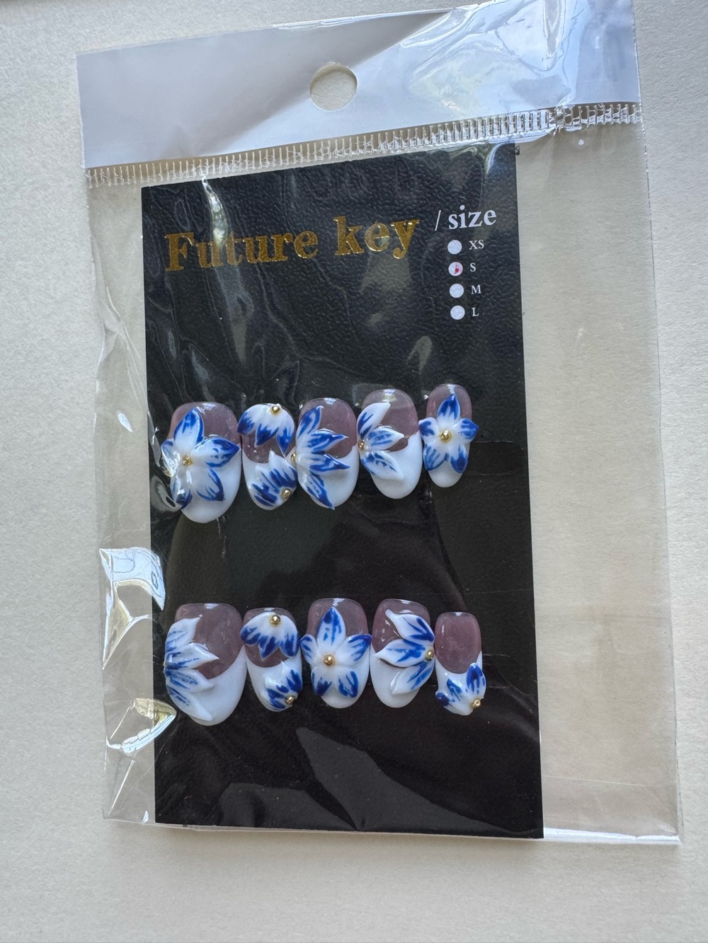 Future Key White French Tip Blue Floral Press-On Nails Oval